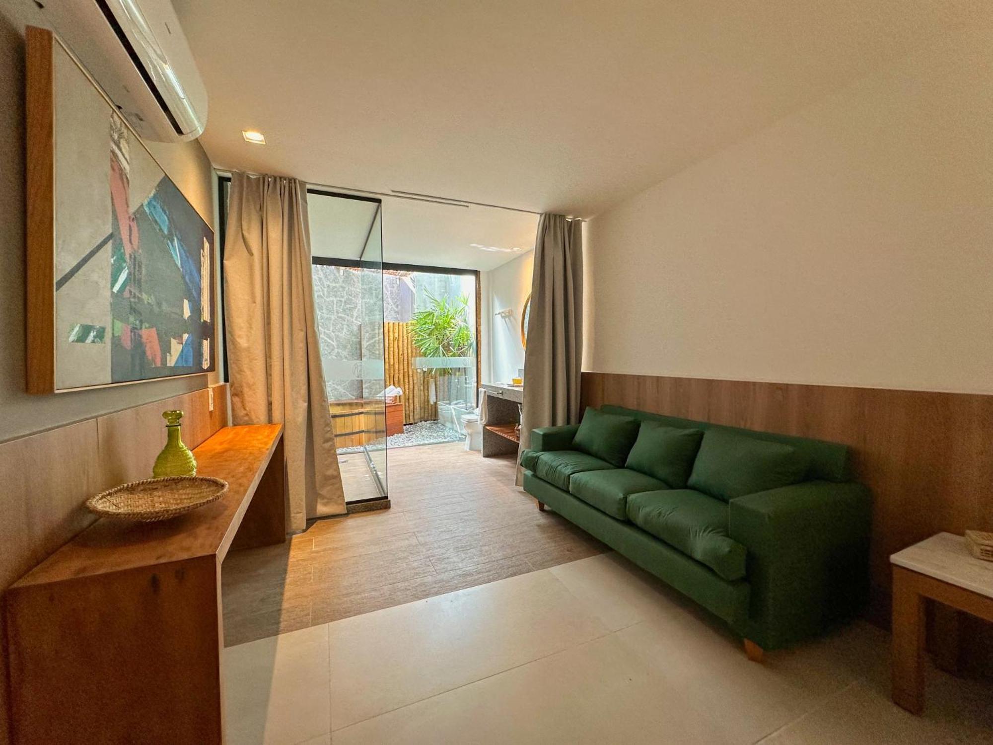 Passagem Concept Hotel e Spa Cabo Frio Buitenkant foto A living room in a micro apartment in Beijing, China